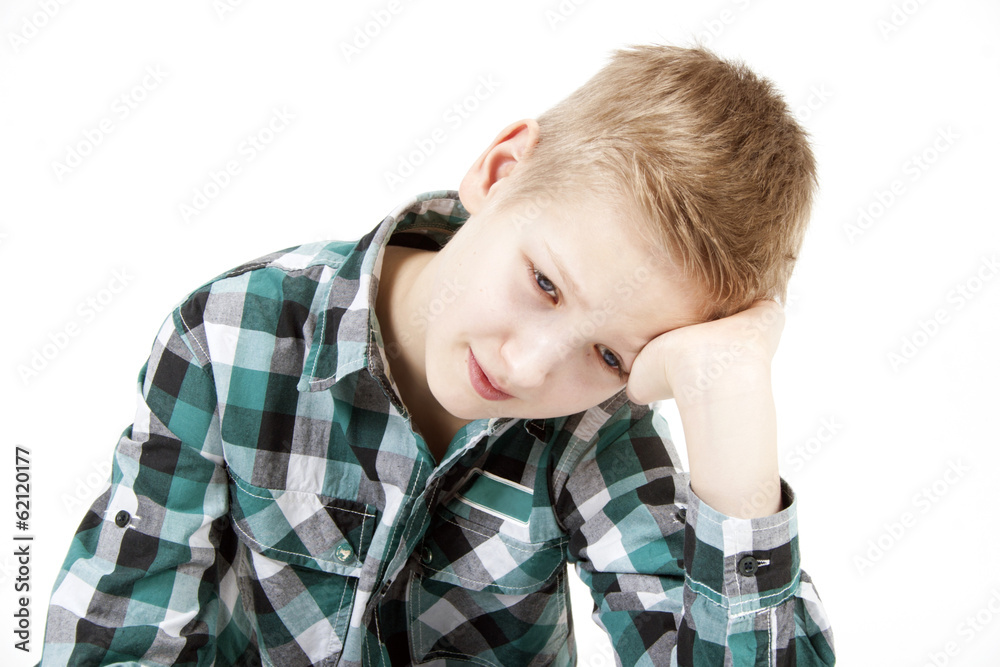 Boy in thought on a white background Boy in thought on a white background