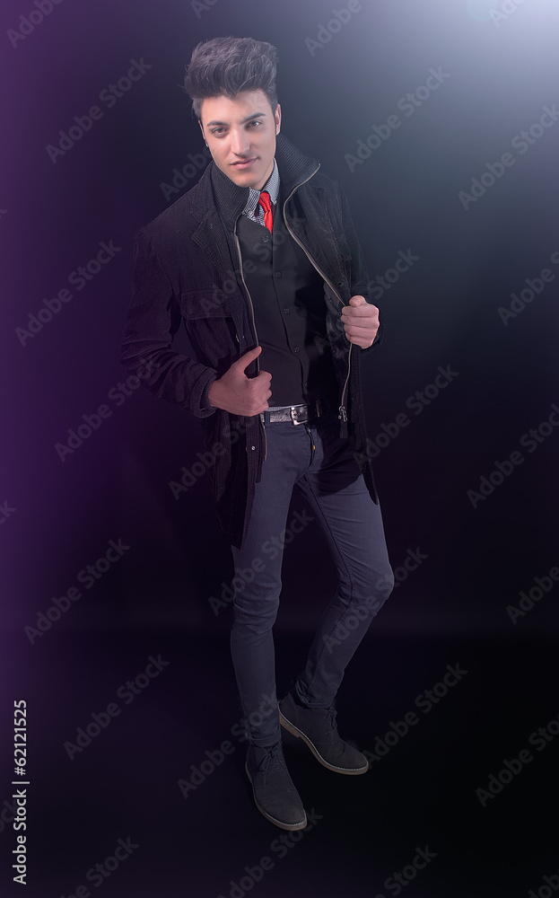 Fashion young man in jeans and jacket
