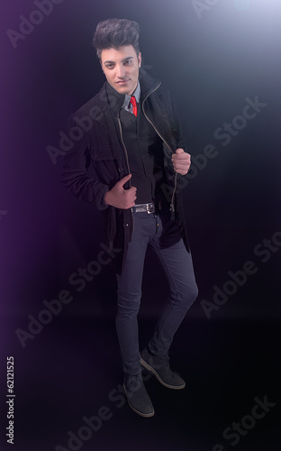 Fashion young man in jeans and jacket