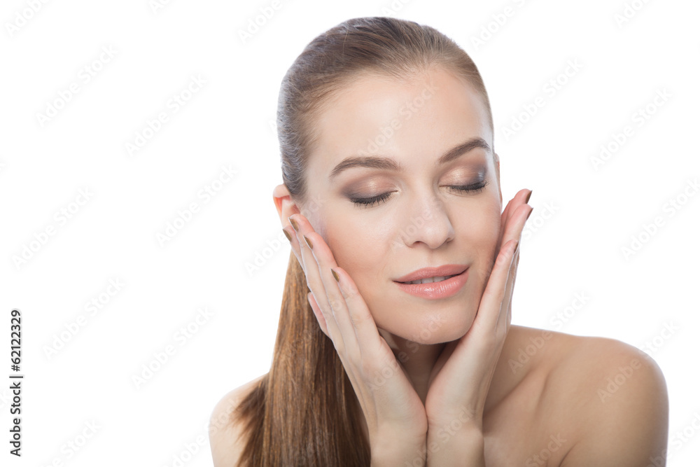 Attractive woman touching her face Attractive woman touching her face