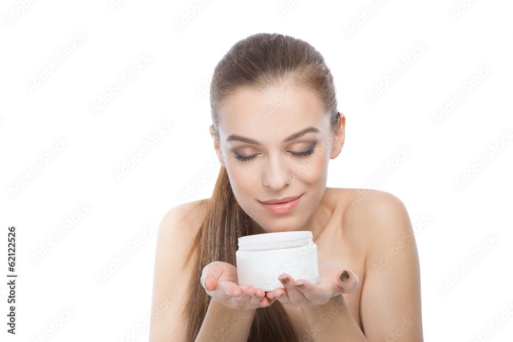 Woman with a moisturizer or body treatment Woman with a moisturizer or body treatment