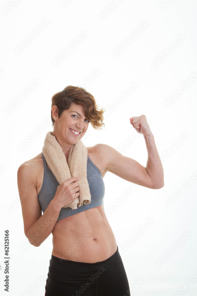 healthy slim woman showing muscles. healthy slim woman showing muscles.