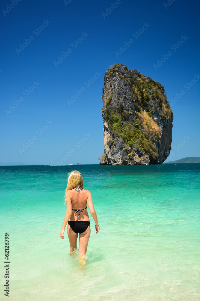 young white girl in the beautiful beach in Thailand