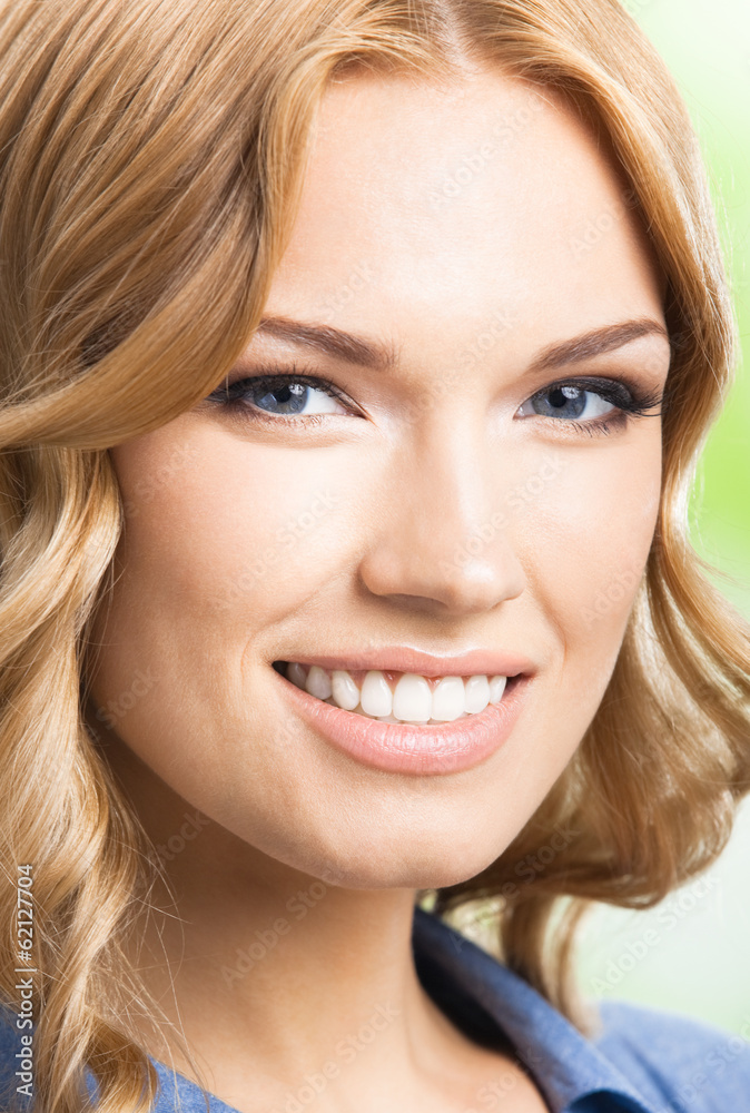Happy smiling woman with long hair, outdoor Happy smiling woman with long hair, outdoor