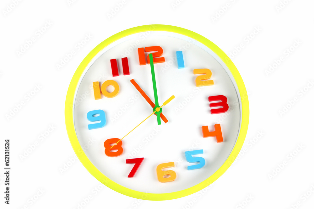 Colorful clock in telling time of eleven o'clock. Colorful clock in telling time of eleven o'clock.