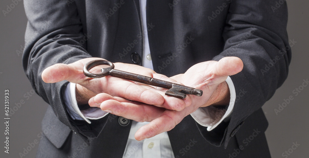 Fototapeta premium displaying an old key for unlocking a career