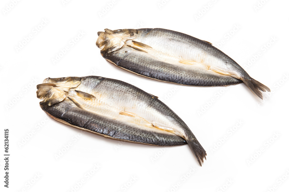 Kippers isolated on a white studio background. Kippers isolated on a white studio background.