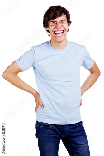 Laughing guy in glasses with arms akimbo over white