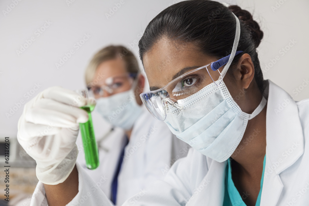 Female Asian Scientist with Test Tube In Laboratory Female Asian Scientist with Test Tube In Laboratory