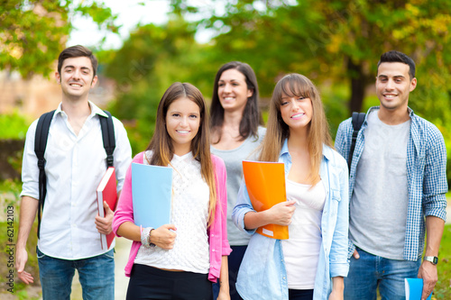 Smiling group of student at the park photo