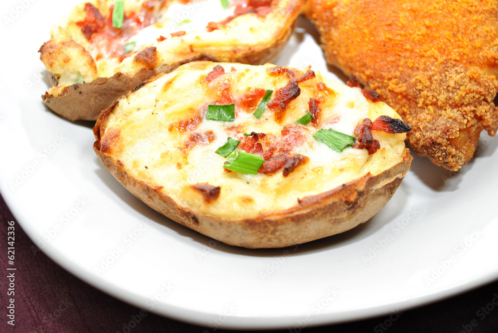 Twice Baked Potato with Chives and Bacon Pieces