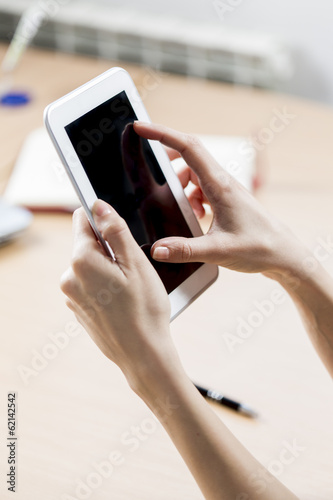 Young woman with tablet