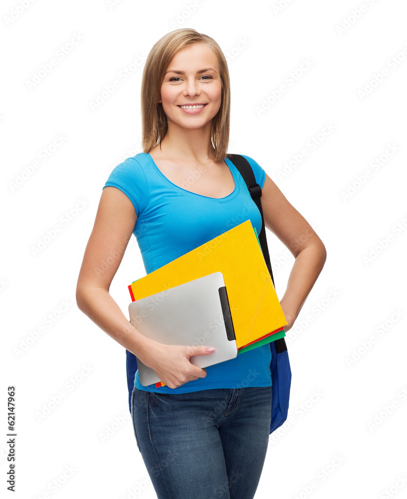 smiling student with bag, folders and tablet pc smiling student with bag, folders and tablet pc