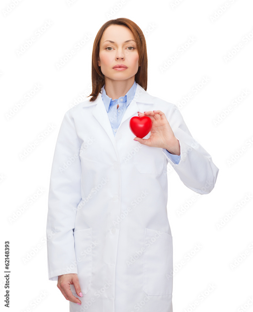 serious female doctor with heart serious female doctor with heart