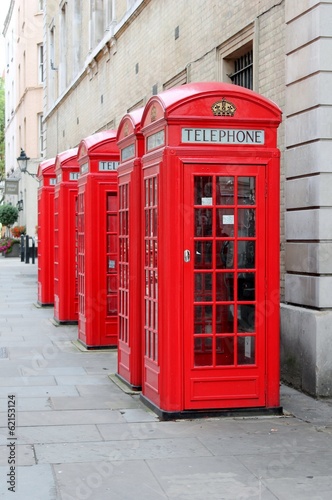 Red telephone pay phone London England UK
