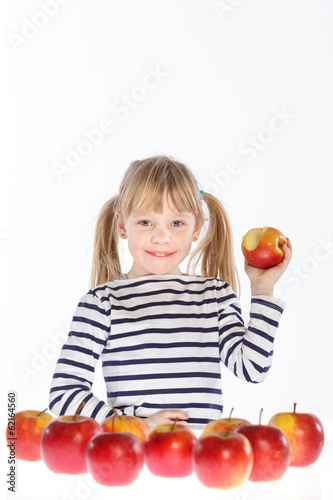 girl with apples on a white background photo