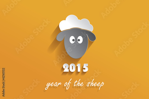 Happy new year 2015 creative greeting card design with sheep