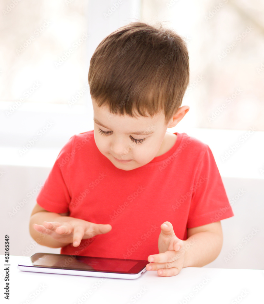 Boy using tablet Boy using tablet