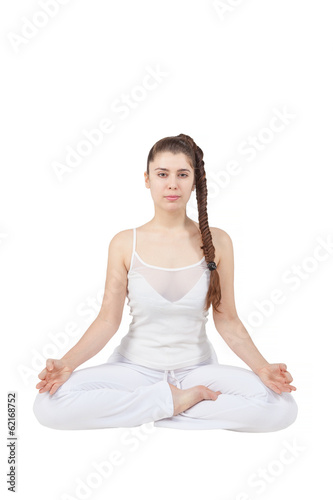 Woman in lotus yoga pose - isolated on white background