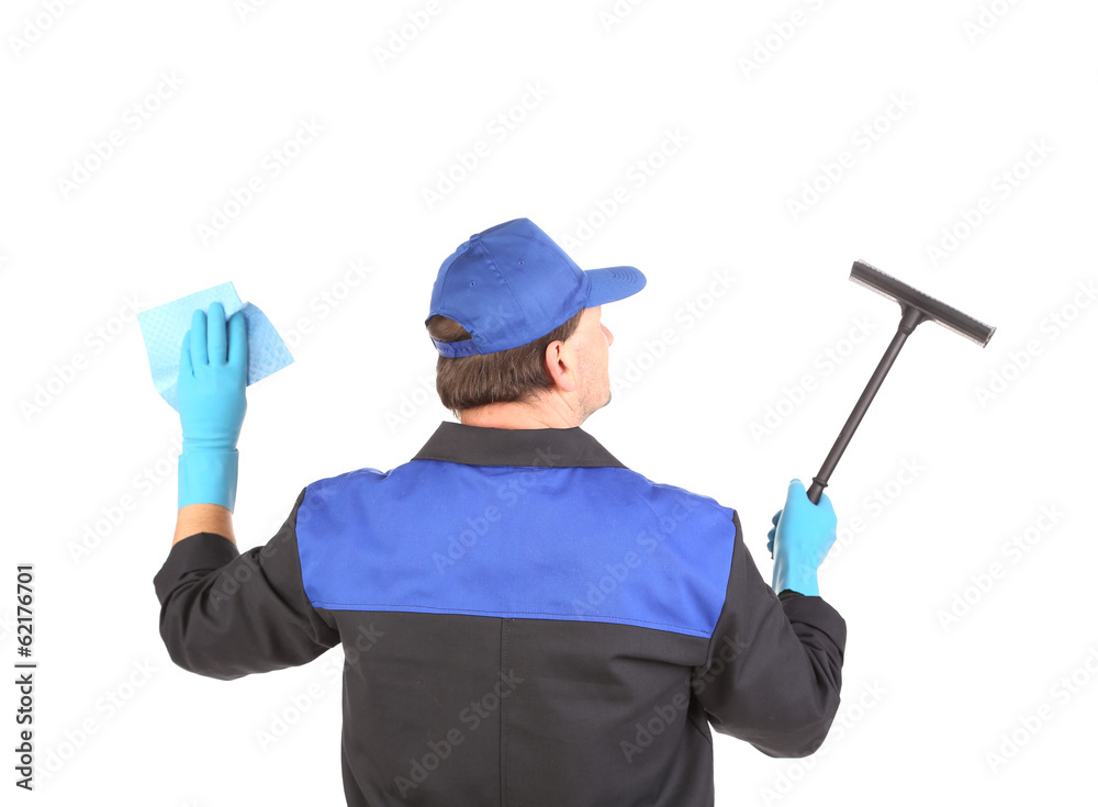 Worker in gloves with window cleaner. Worker in gloves with window cleaner.