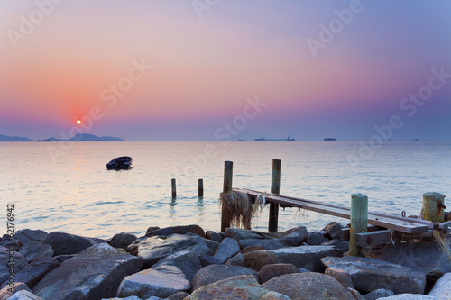 Sunset at rocky shore