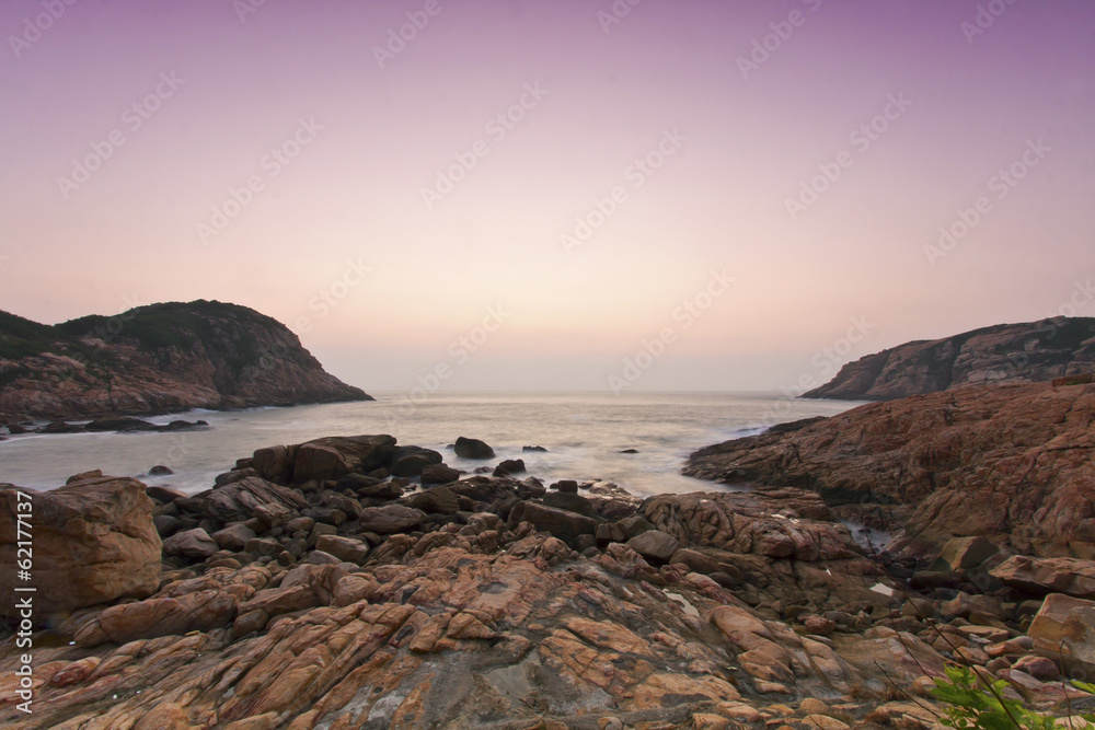 Sunrise rocky coastline