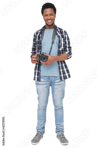Portrait of a happy male photographer