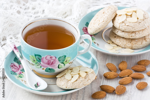Cup tea with almond cookies