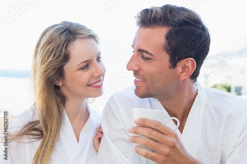 Close-up of a happy couple having coffee