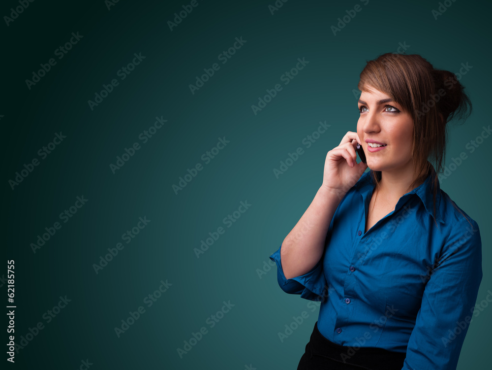 Young woman making phone call with copy space Young woman making phone call with copy space