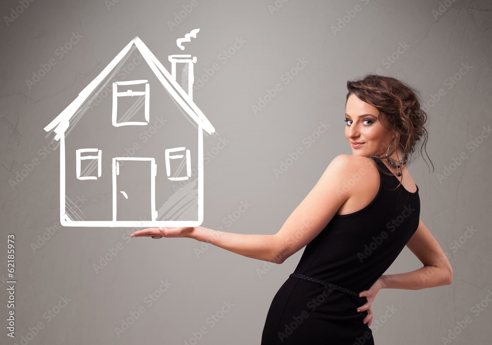 Young lady holding a huge drawn house Young lady holding a huge drawn house