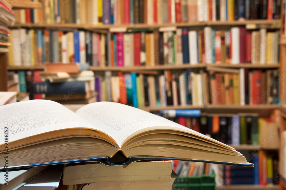 Open book with an old library background Open book with an old library background