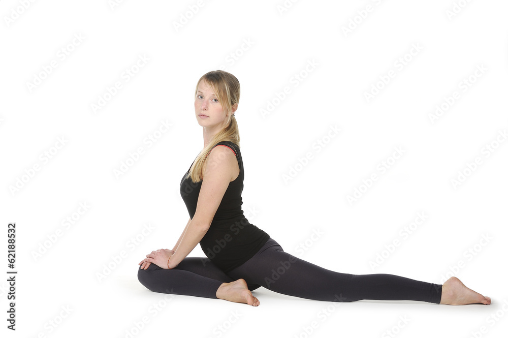 Beautiful young woman in great shape practicing yoga Beautiful young woman in great shape practicing yoga