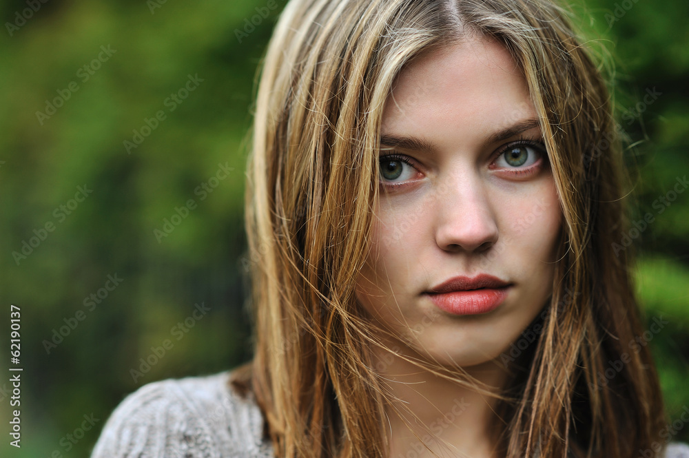 Portrait of the beautiful girl close-up