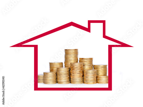 Many coins in column in house. Financial concept.