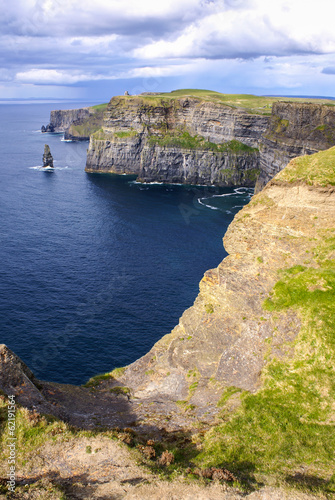 Famous cliffs of Moher with tower. Ireland