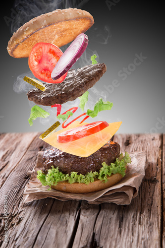 delicious hamburger on wood
