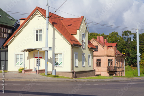 Fototapeta Naklejka Na Ścianę i Meble -  Empty street and small house in morning