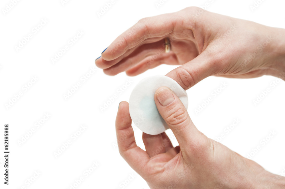 manicure process: removing nail polish with nail-polish remover manicure process: removing nail polish with nail-polish remover