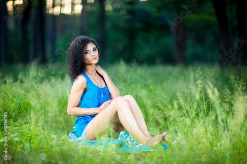 Portrait of the young beautiful woman outdoors © Sergii Figurnyi