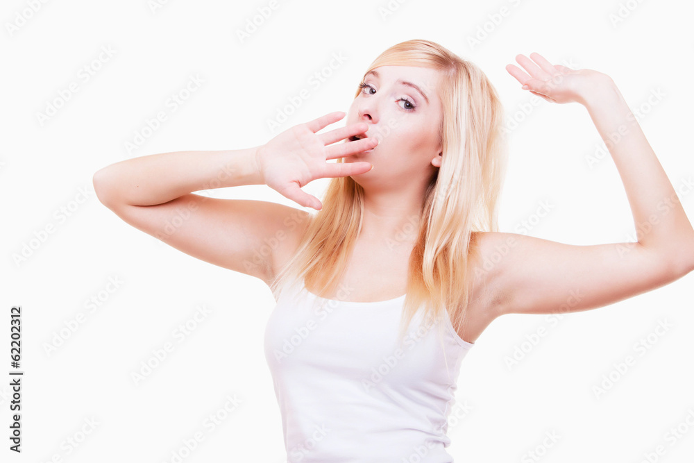 Sleepy tired young woman yawning isolated on white Sleepy tired young woman yawning isolated on white