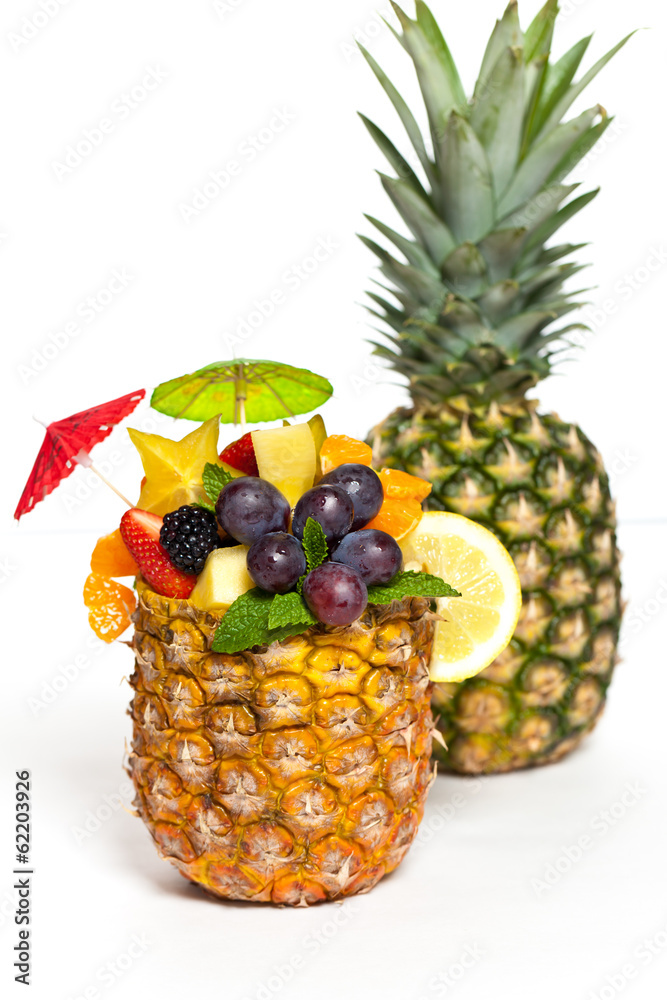 Fresh Fruit Salad in a Pineapple. Selective focus. Fresh Fruit Salad in a Pineapple. Selective focus.