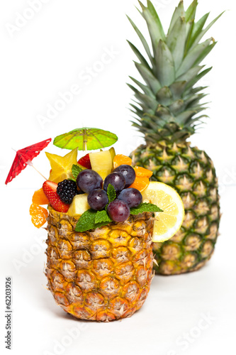 Fototapeta Naklejka Na Ścianę i Meble -  Fresh Fruit Salad in a Pineapple. Selective focus.
