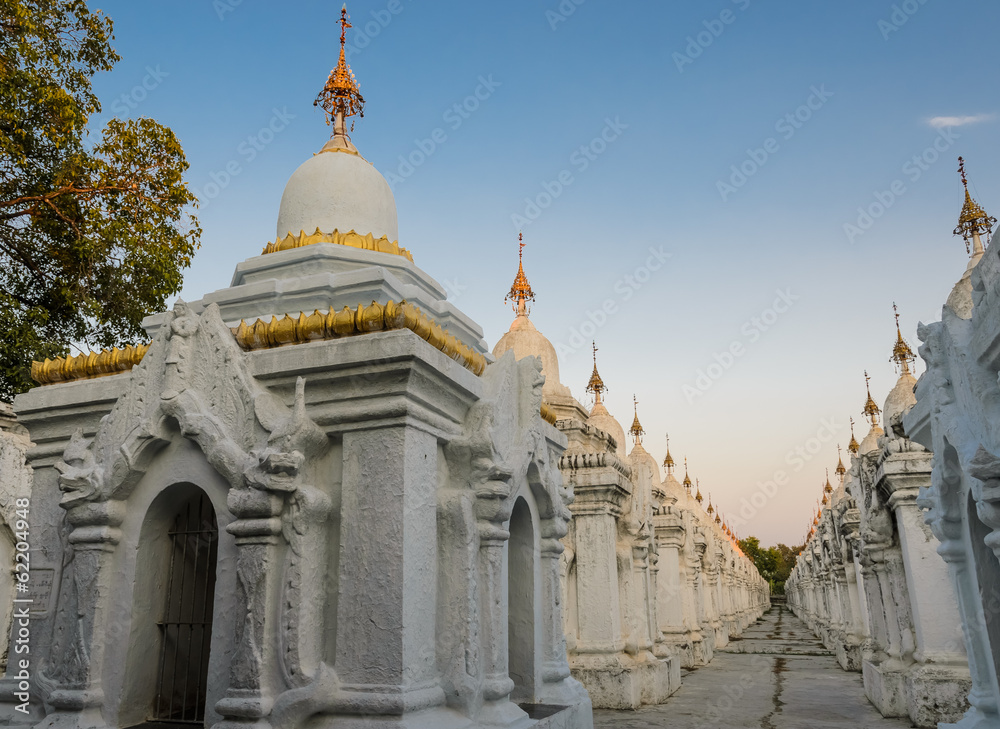 Kuthodaw Pagoda in Mandalay, Myanmar. The largest book of the wo Kuthodaw Pagoda in Mandalay, Myanmar. The largest book of the wo