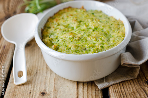 Casserole with cheese and wild garlic