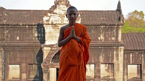 cambodian monk in angkor wat temple