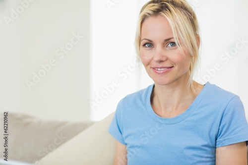 Closeup portrait of a beautiful smiling young woman