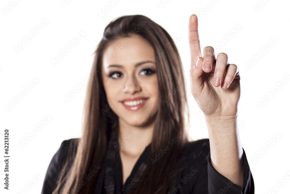 young smiling beautiful woman touching an empty space young smiling beautiful woman touching an empty space