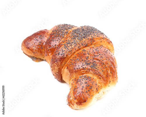 Appetizing croissant with poppy.