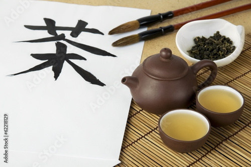 Tea ceremony set with hieroglyph 'Tea' and calligraphic brushes